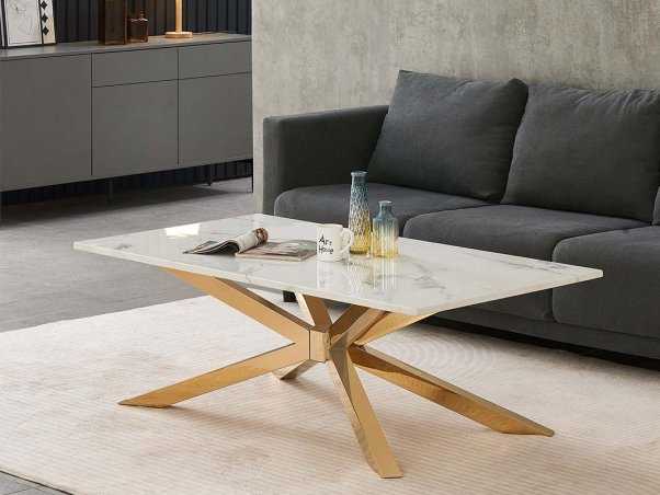 Table basse FONDY marbre pied doré. disponible en stock . Livraison gratuite sous 5 jours France entière.